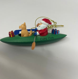 Santa and his dog in a Kayak Ornament